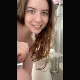 A pretty girl stands above a toilet while shitting. Poop action is clearly seen from her rear. Vertical HD format video. About a minute..